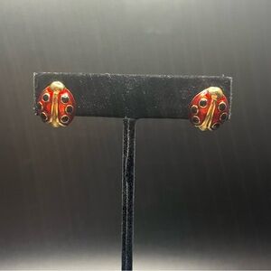 Avon vintage lady bug earrings. Gold tone with black and red enamel coloring.